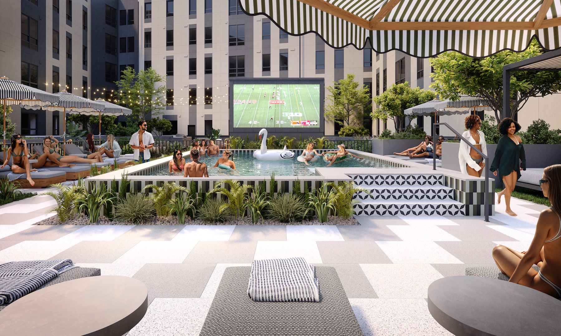 University of Maryland students watching the Terrapins football game on the jumbotron in the Rambler College Park pool